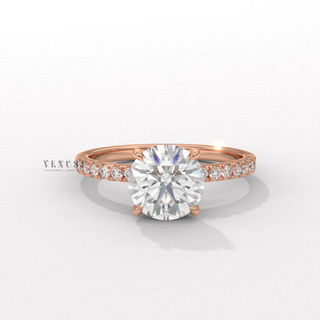 Round cut moissanite ring with half pave detail