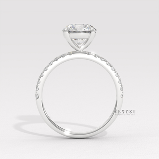 Elegant round half pave moissanite ring design