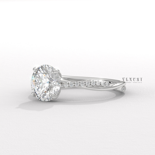 Infinity moissanite engagement ring angled view