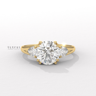 Round brilliant three stone moissanite ring front view