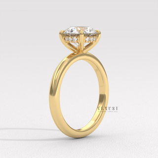 Overhead close-up of a round cut moissanite engagement ring in a solitaire setting