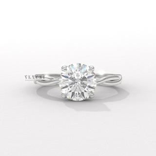 Full view of a round cut moissanite engagement ring on an infinity band with band detail