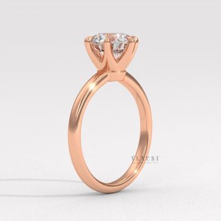 Rose gold round cut moissanite ring on hand  Round Solitaire detail view 8