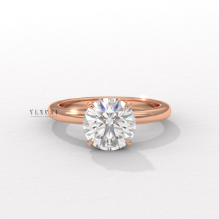 Round cut moissanite ring with lotus prong setting