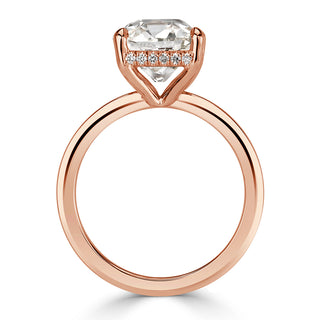Old mine cushion hidden halo moissanite engagement ring close up detail