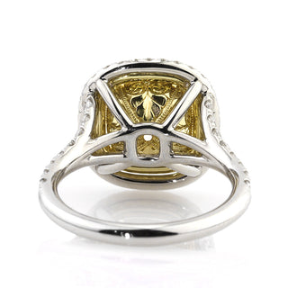 Yellow cushion double halo moissanite engagement ring angled sparkle view