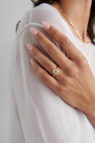 cushion cut moissanite engagement ring antique hand view
