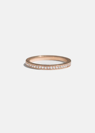 Luminous 2.0ct round pave moissanite wedding band close up of the setting