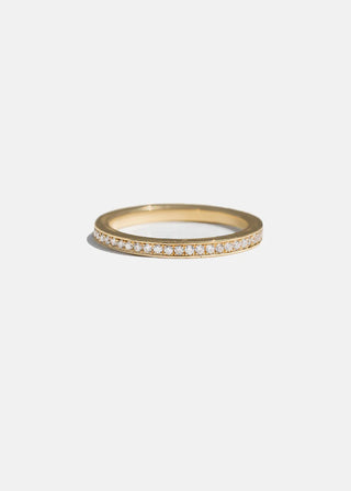 Luminous 2.0ct round pave moissanite wedding band side profile view