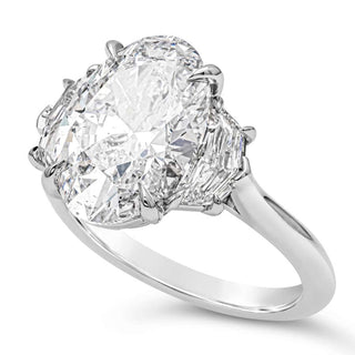 Elongated oval three stone moissanite engagement ring stone detail view