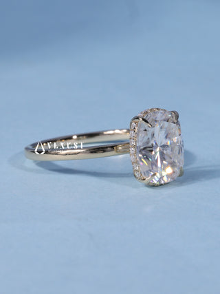Shimmering 1.50ct cushion hidden halo moissanite ring angled view showing its sparkle