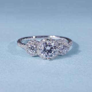 Round Halo 3 Stone Moissanite Engagement Ring with Pave front view