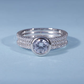 Round Moissanite Three Row Pave Engagement Ring with Bezel front view