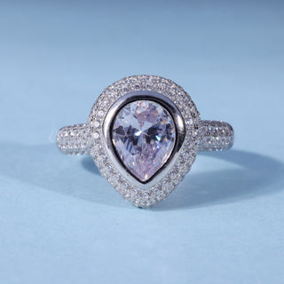 Pear Cut Bezel Moissanite Halo Engagement Ring with Pave front view
