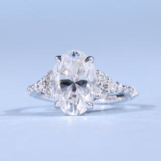 Brilliant 2.0ct oval cluster moissanite ring front view