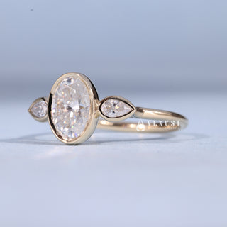 1.50CT Bezel Set Oval Moissanite Diamond Three Stone Engagement Rings