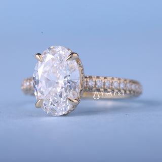 Modern 2.50ct oval hidden halo moissanite ring angled view showing its sparkle