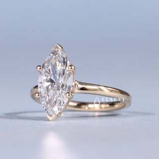 Sparkling 1.50ct marquise solitaire moissanite ring angled view showing its sparkle