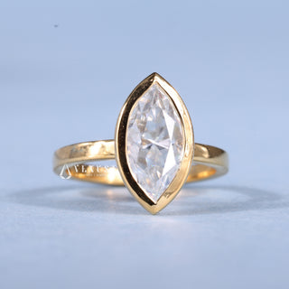 Luminous 1.0ct marquise solitaire moissanite ring angled view showing its sparkle