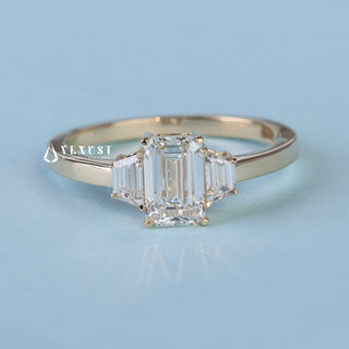 Side profile of Emerald Cut 3 Stone Moissanite Engagement Ring with Accents