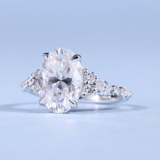 Brilliant 2.0ct oval cluster moissanite ring angled view showing its sparkle