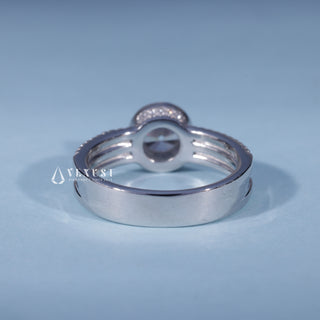 Angled view of Round Moissanite Three Row Pave Engagement Ring with Bezel