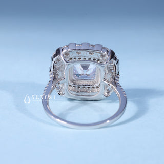 Angled view of Asscher Cut Cathedral Moissanite Engagement Ring with Halo