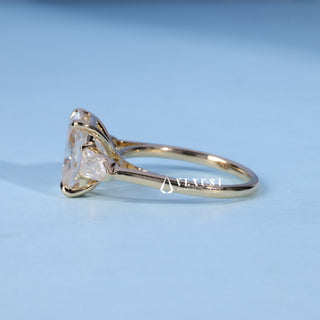 Angled view of Elongated Cushion Cut Three Stone Moissanite Engagement Ring