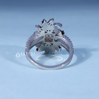 Angled view of 0.70CT Round Moissanite Baguette Cluster Engagement Ring
