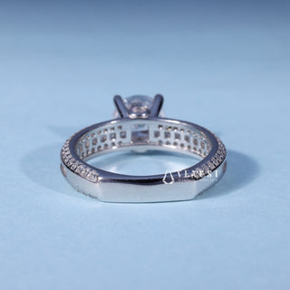 Angled view of Round Cut Moissanite Three Row Pave Engagement Ring