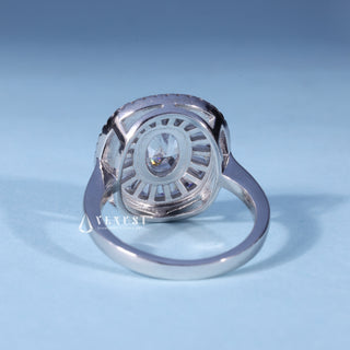 Angled view of Oval Cut Bezel Set Moissanite Engagement Ring with Halo