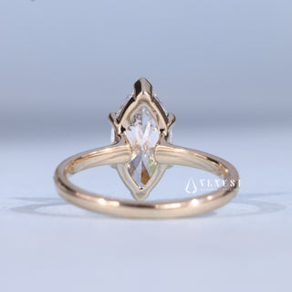 Sparkling 1.50ct marquise solitaire moissanite ring close up of the setting
