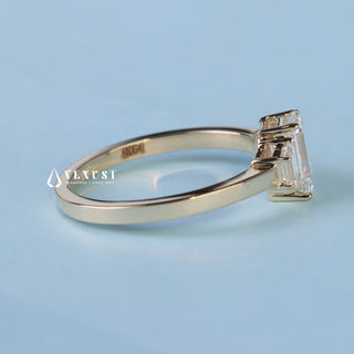 Top view of Emerald Cut 3 Stone Moissanite Engagement Ring with Accents
