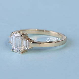 Under gallery detail of Emerald Cut 3 Stone Moissanite Engagement Ring with Accents