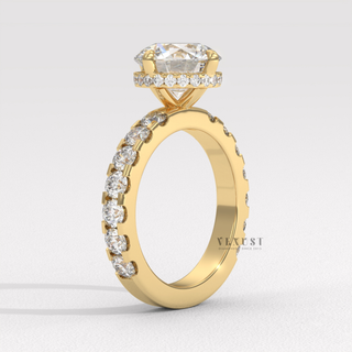 Lifestyle photo of a round cut moissanite engagement ring with a hidden halo and pave band on the hand