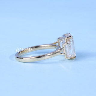 Dazzling 2.0ct emerald three stone moissanite ring side profile view