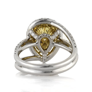 Yellow pear halo bypass moissanite engagement ring close up detail