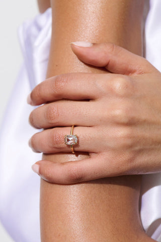 cushion cut moissanite engagement ring hand wearing view