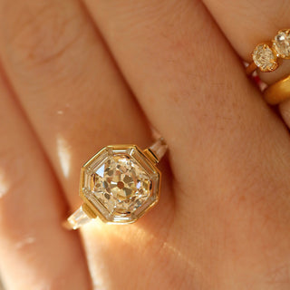 hexagon moissanite ring halo hand view