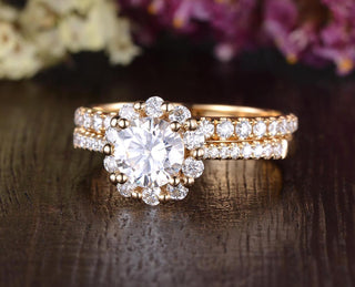 Graceful 0.75ct round halo moissanite ring side profile view