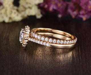 Graceful 0.75ct round halo moissanite ring shown on a finger
