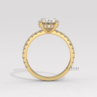 Rose gold oval cut moissanite ring on hand